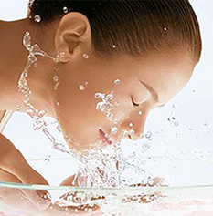Woman washing face